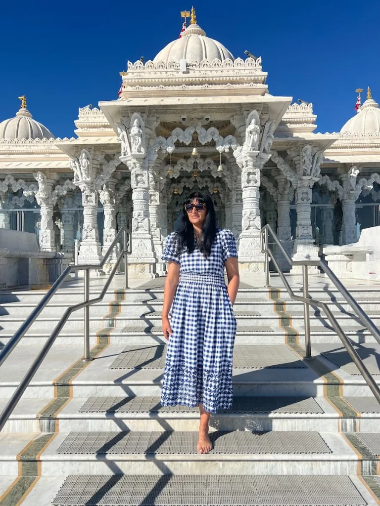3 days in Houston: BAPS Swaminarayan Temple with Bejal standing in front of entrance