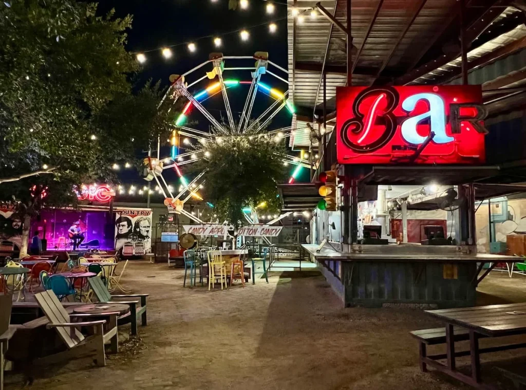 Truckyard, Houston interiors with ferris wheel and neon lights
