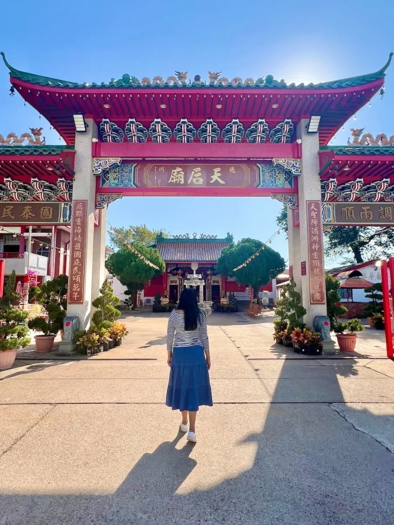 Photo locations in Houston: Teen How Taoist Temple exterior with Bejal standing in middle