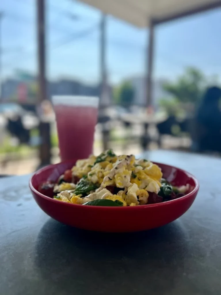 Vegetarian breakfast hash with iced strawberry drink at Leeland House, Houston