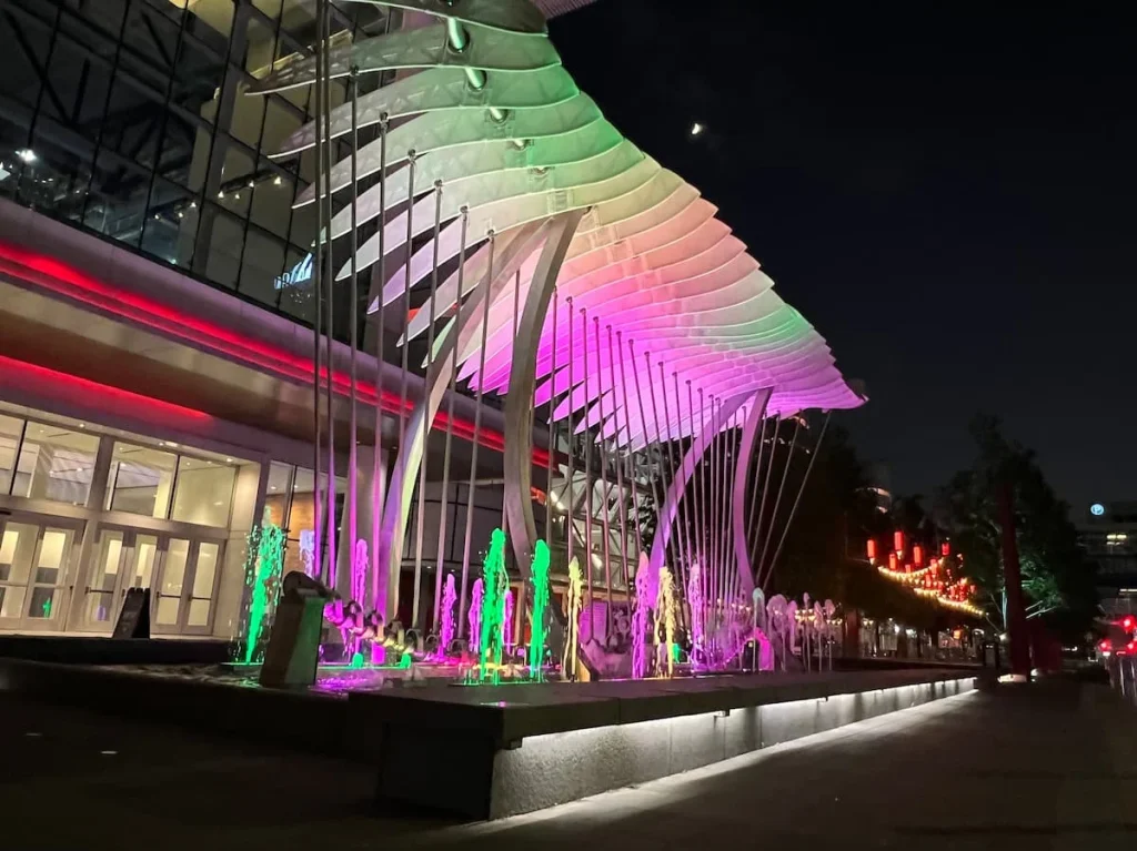 Photo locations in Houston: Wings over Water feature with multi-lights illuminating the sculpture
