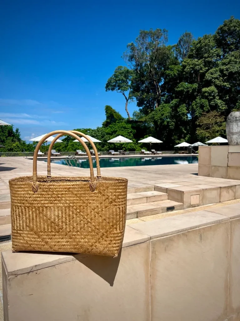 Sustainability at The Datai Langkawi: Basket beach bag in front of Main pool at The Datai Langkawi