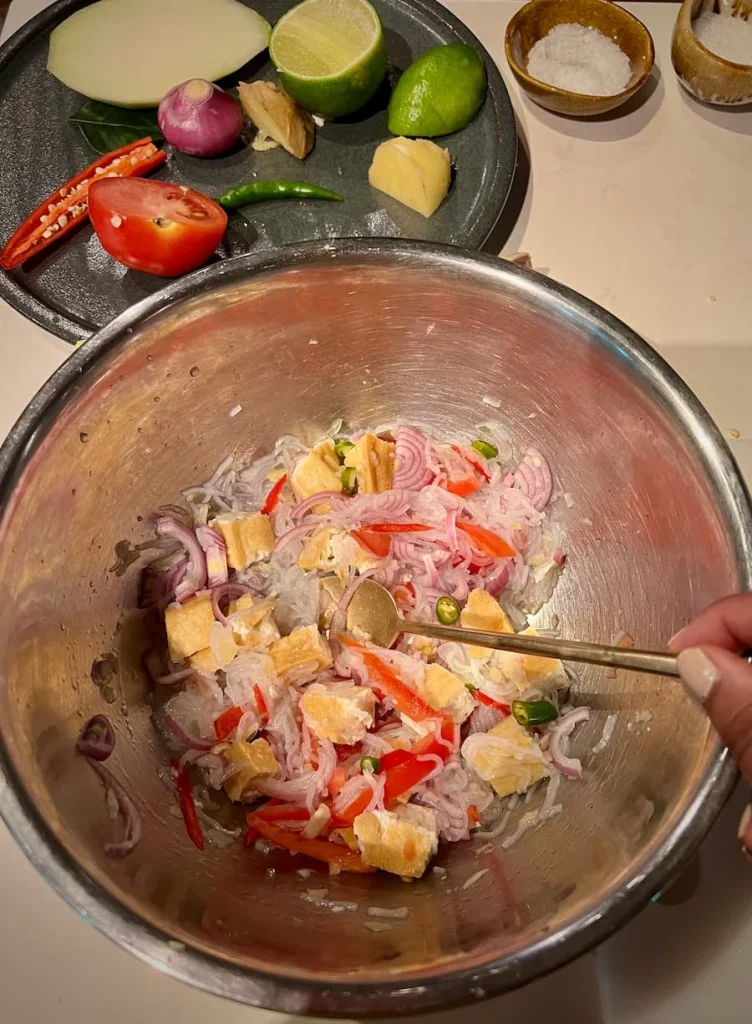 Bejal carrying a plate of vegetables