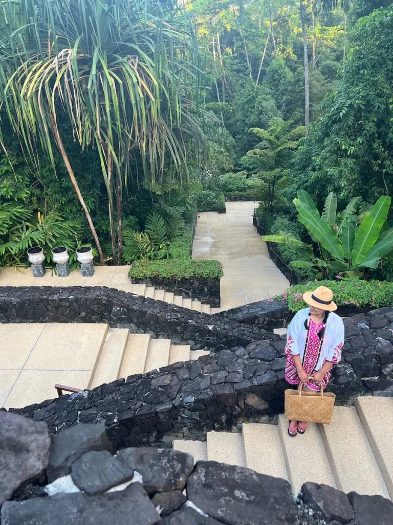 Bejal standing at the top of the Datai Langkawi grand staircase