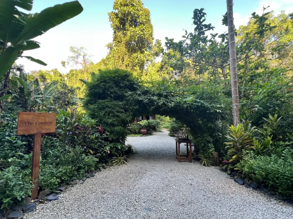 Entrance to Permaculture Garden with wooden sign at The Datai Langkawi