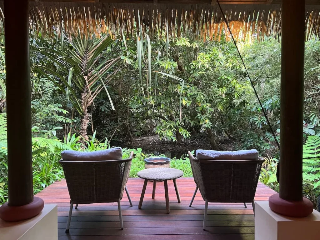 Things to do in Langkawi: Rattan chairs at The Data Spa Langkai with views of the stream