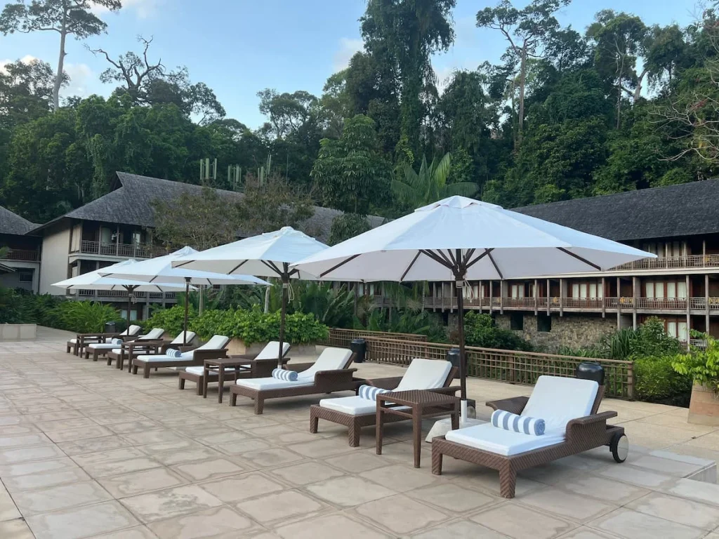 Side view of umbrellas at the Main Pool at The Datai Langkawi