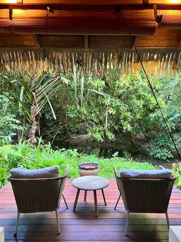 Exterior of spa room with brown door at The Datai Langkawi