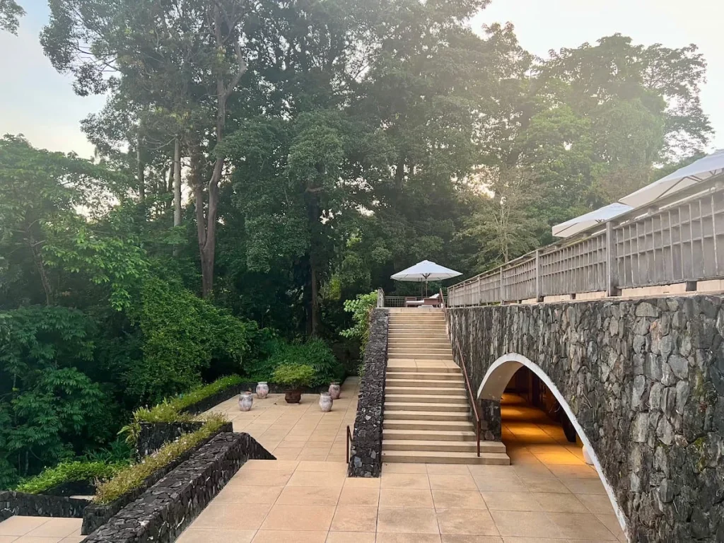 Bejal standing at the top of the Datai Langkawi grand staircase