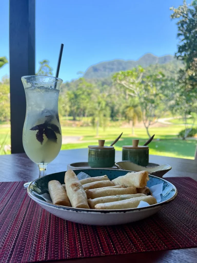 Vegan & vegetarian Food in Langkawi: Vegetable spring rolls at Els Golf Club, Langkawi with the golf course in the background.