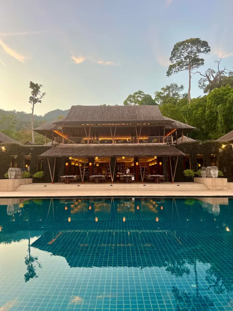 View of The Dining Room behind the pool at The Datai at breakfast