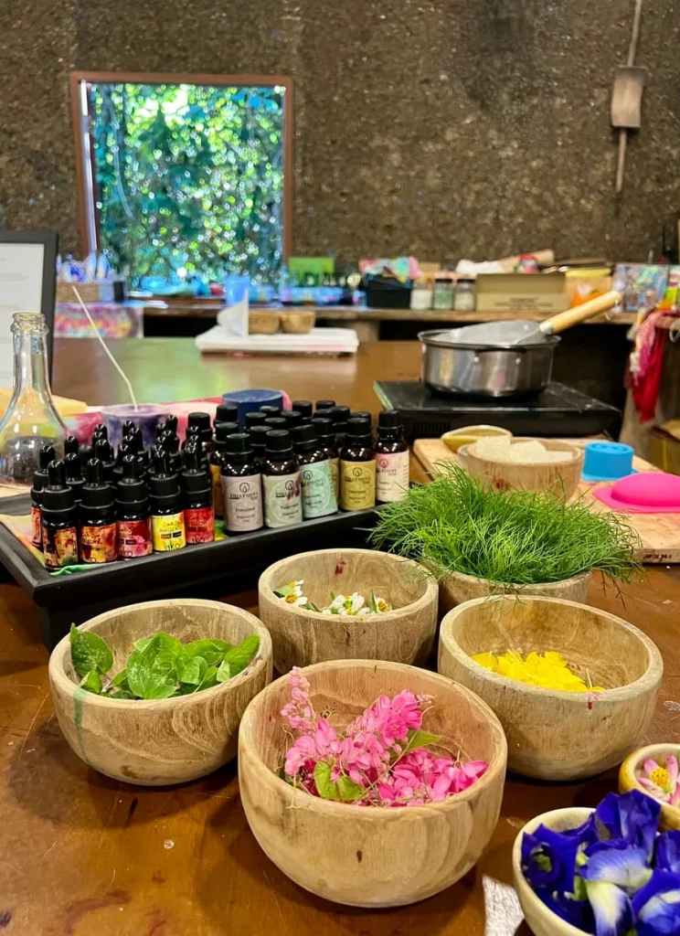 Sustainability at The Datai, Langkawi: Candles and soaps with flowers and plants at the upcycling workshop at The Datai Langkawi