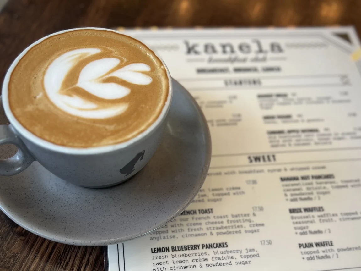 Cappuccino in a grey cup at Kanela, Chicago.