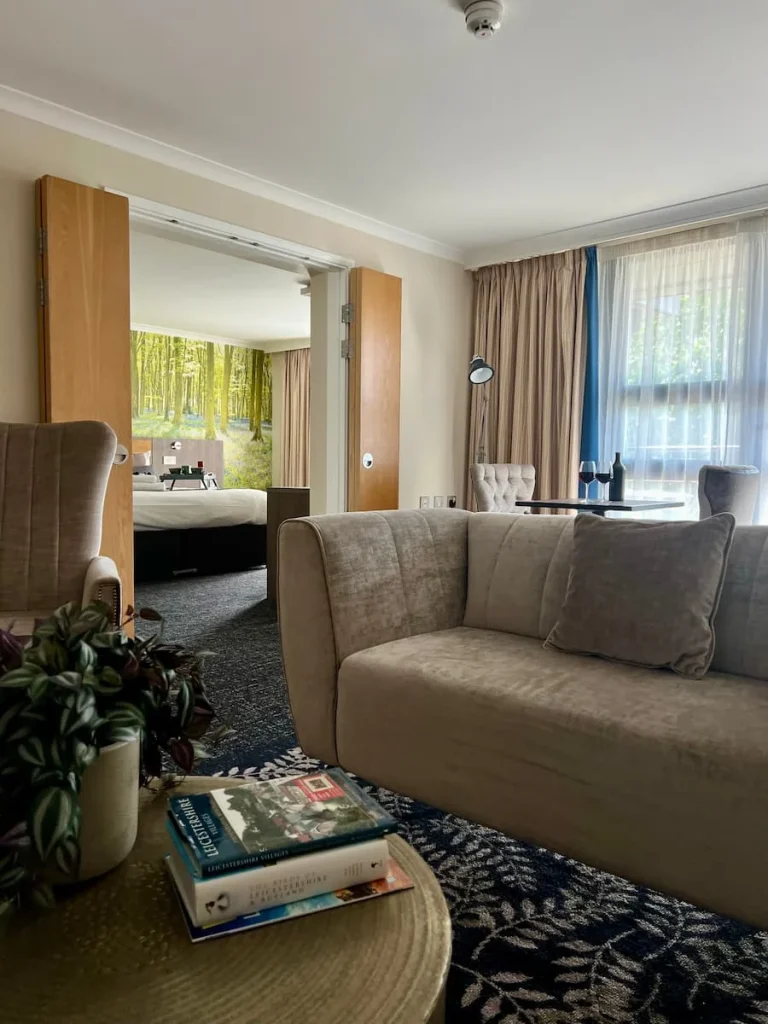 Chancellors Suite angle from the lounge area looking into the bedroom at Burleigh Court Hotel, Loughborough