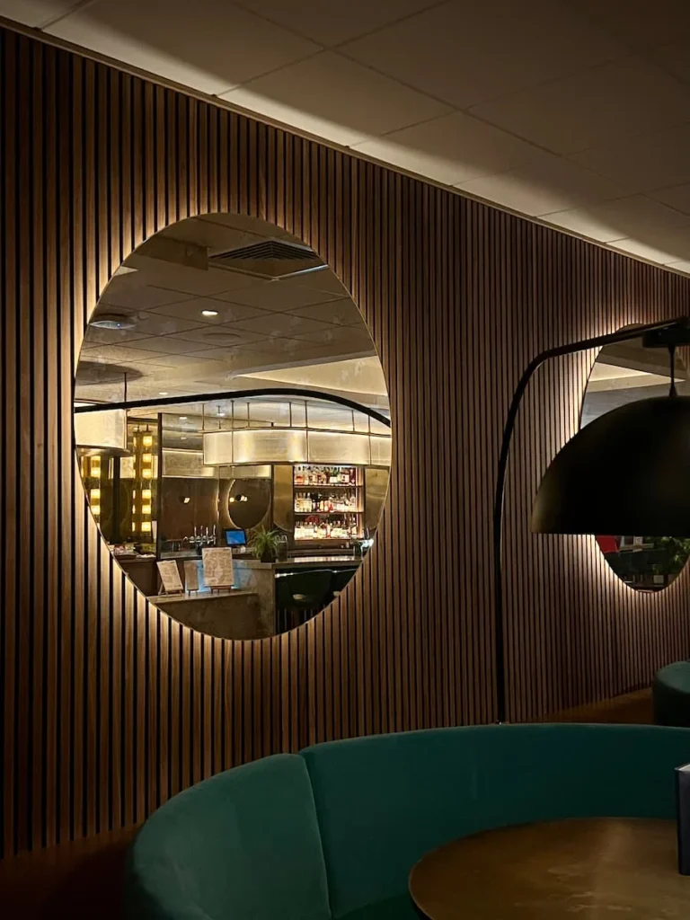 Reflection in the mirror at Carney & Scott's bar, Burleigh Court Hotel, Loughborough