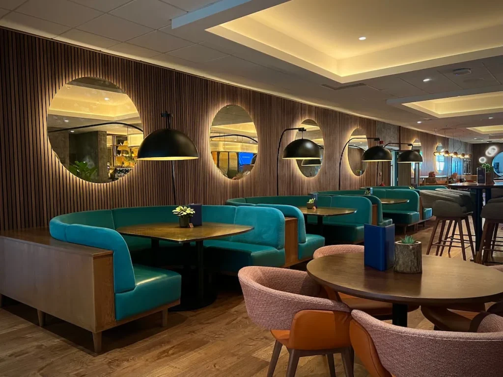 Fifty the street and Burleigh Court Hotel: Side view of booth seating at Carney & Scott's