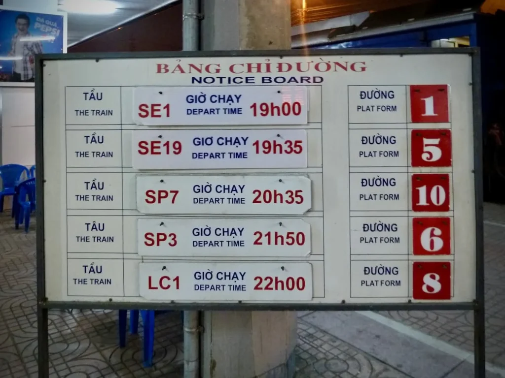 A timetable for the reunification train SE1 in Hanoi train station, Vietnam