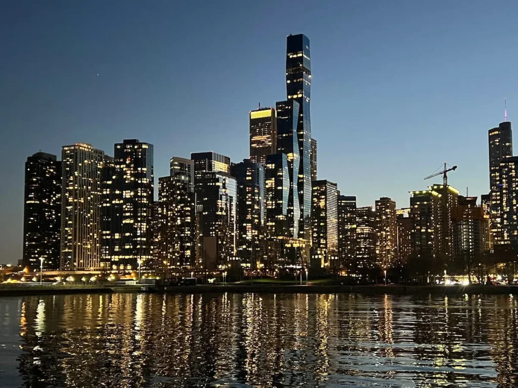 View from Navy Pier landscape in the dark with the skyline twinkling with the lights on.