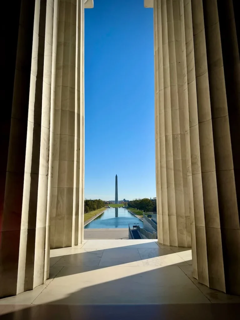 Views looking out from Abraham Lincoln memorial onto the reflective pool