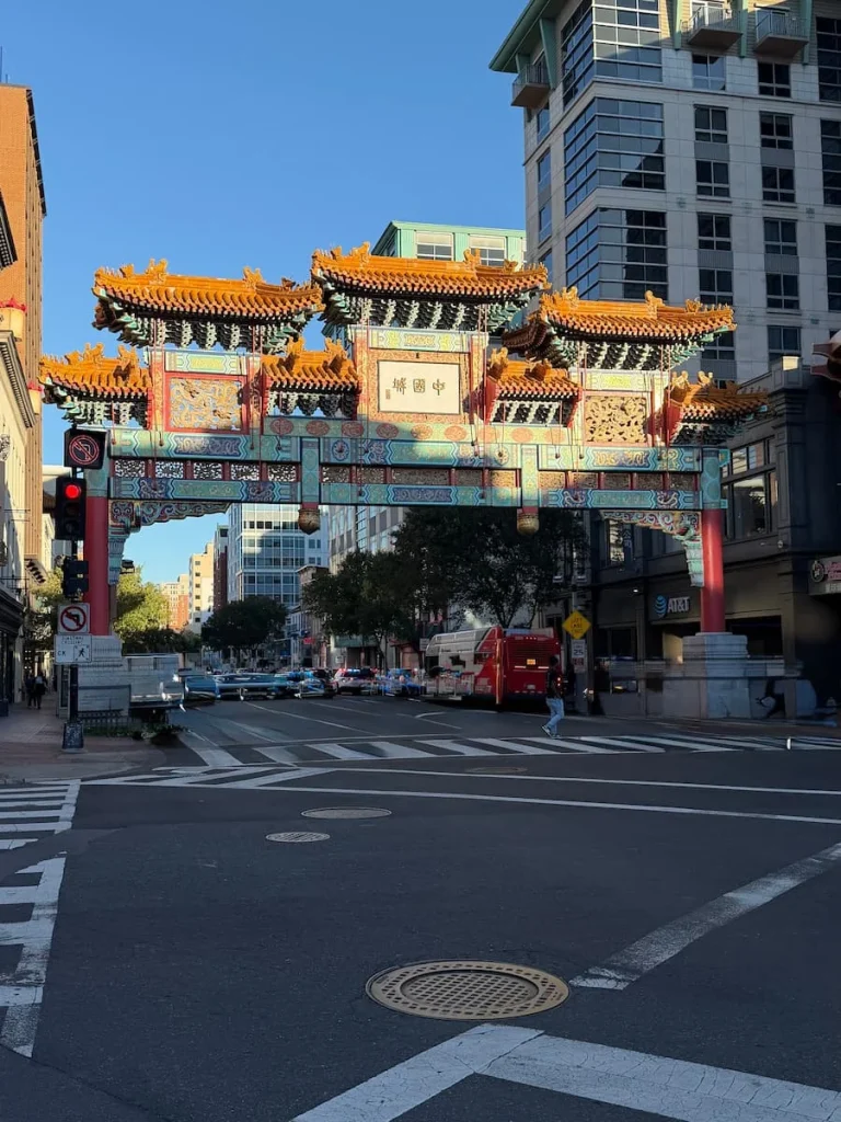Chinatown Gate in Washington DC. Te ornate gate is decorated in bright colours and traditional terracotta roof sections
