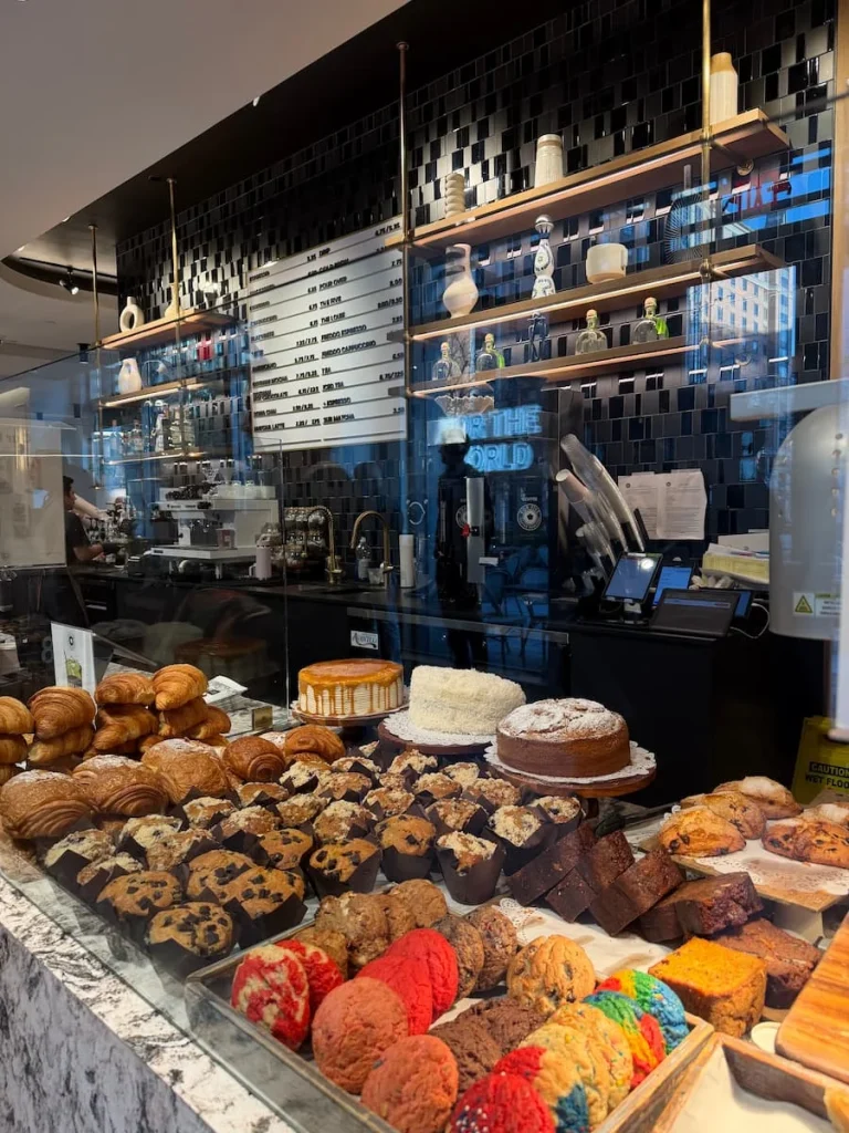 Coffee and food counter at For Five Coffee, Washington DC. All the pastries, cakes and savouries displayed ready to be served