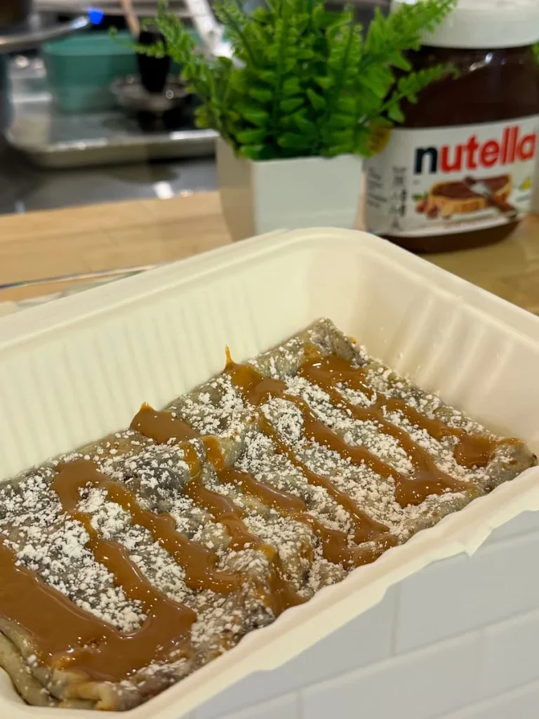 Crepe with pistachio and cinnamon in a paper container at Union Market, Washington DC