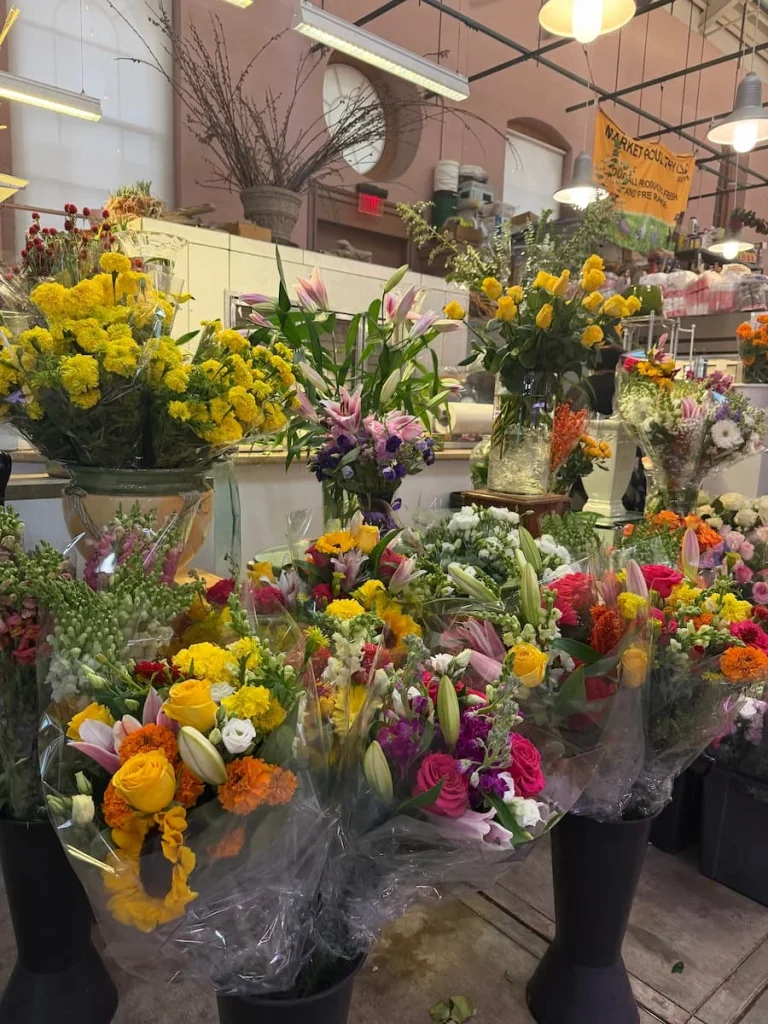 Flower stall with made up bouquets, at Eastern Market in Washington DC