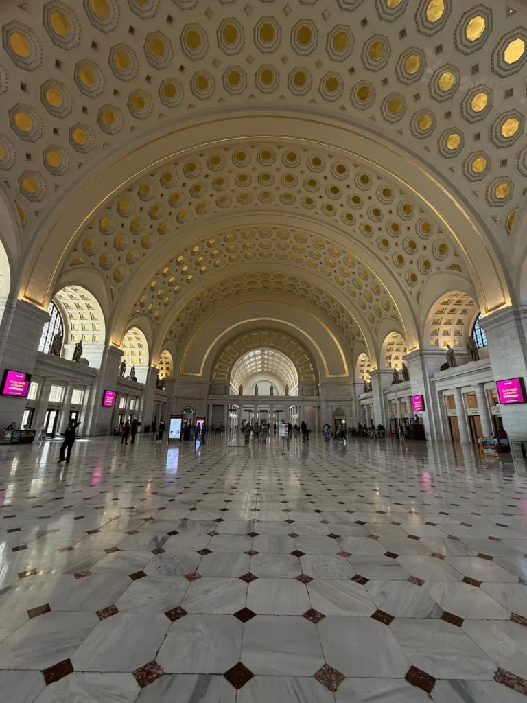 Interiors of Union Station, Washington DC with the carved roof and arches. Sustainable things to do in Washington DC