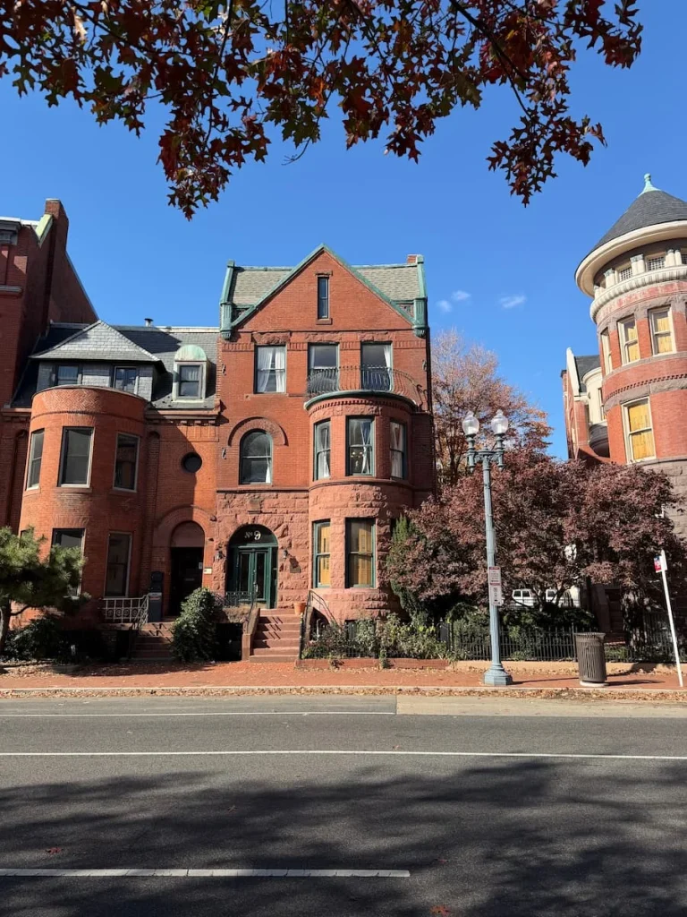 Logan Circle Mansions, Washington DC with turrets and 4 stories of brick Victorian style houses in a circular row
