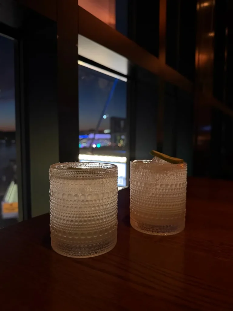 Mezcal Margaritas and view of District Wharf waters from window at Mi Vida, Washington DC