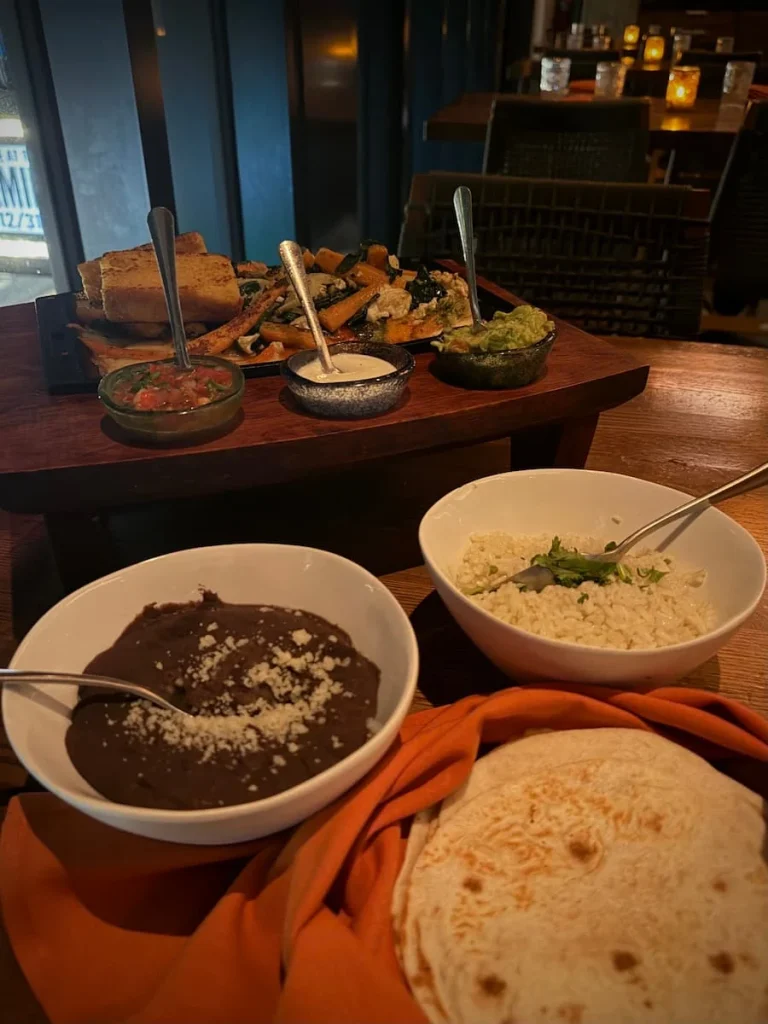 Vegetable Fajita main course at Mu Vida, Washington DC. There are separate Fajitas, refried beans and rice