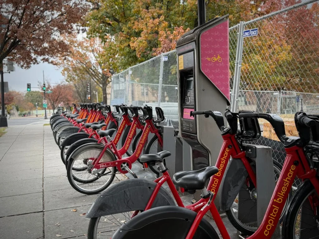 A row of red Bikeshare bicycles parked in a row in Washington DC