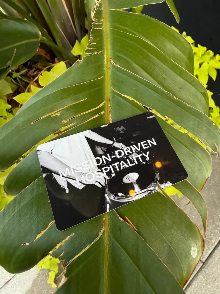 Mission led hospitality black and white keycard at Eaton DC, Washington DC on a green large leaf