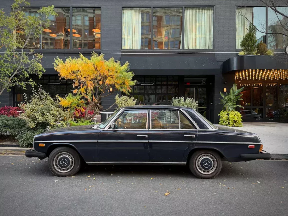 Exterior of Hotel at Eaton DC, Washington DC with a vintage black Mercedes car at the front