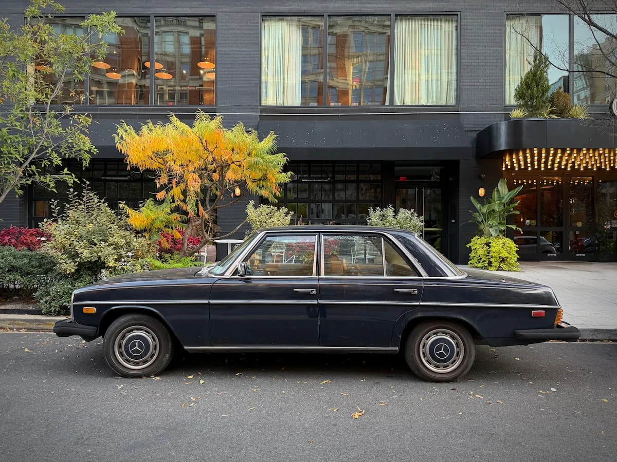 Exterior of Hotel at Eaton DC, Washington DC with a vintage black Mercedes car at the front