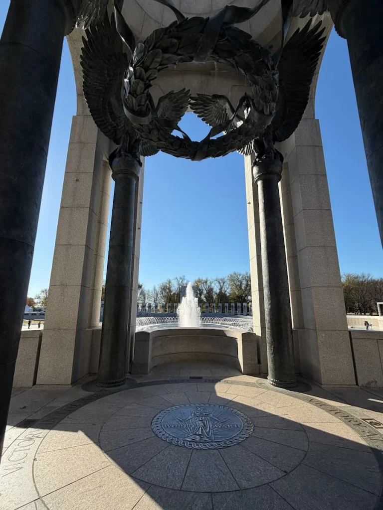 World War II Memorial Washington DC Walkway with ornate stone carvings and wreathes