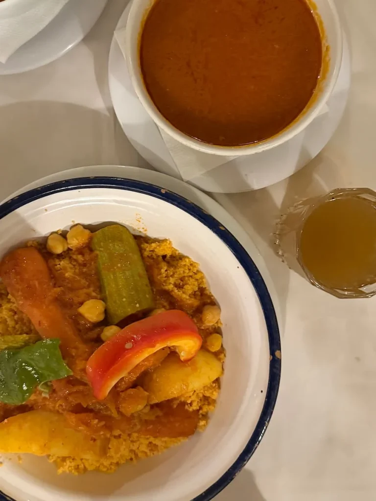 A top lay of Couscous with tomato sauce at Au Bon Vieux Temps, Sidi Bou Said