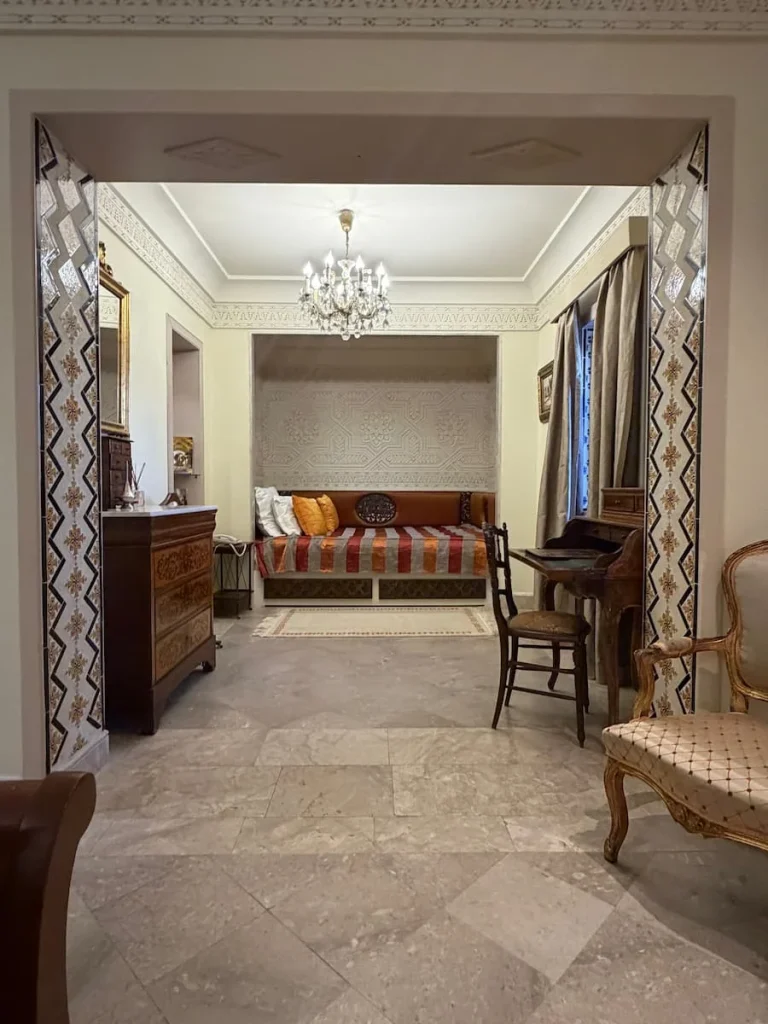 Dar Alouini bedroom area decorated in an elaborate traditional Arabian style with locally designed linens, Kairouan