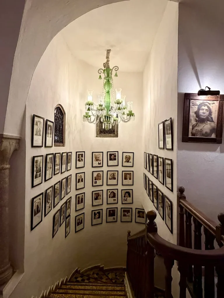 Inside Au Bon Vieux Temps restaurant, Sidi Bou Said. There are photo graphs of famous guests who ate ger along the stairs