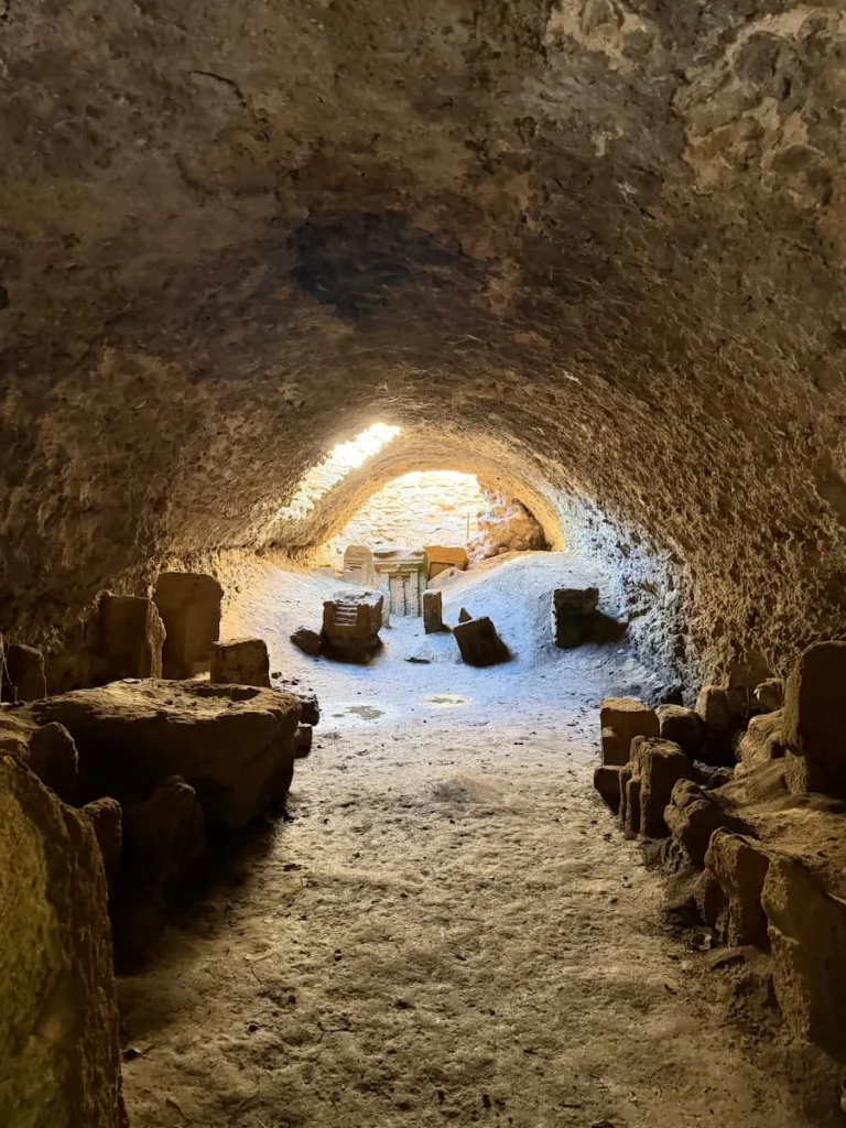 Punic Tophet Carthage, Tunisia. Carbed stones seen through a cave with light shining through