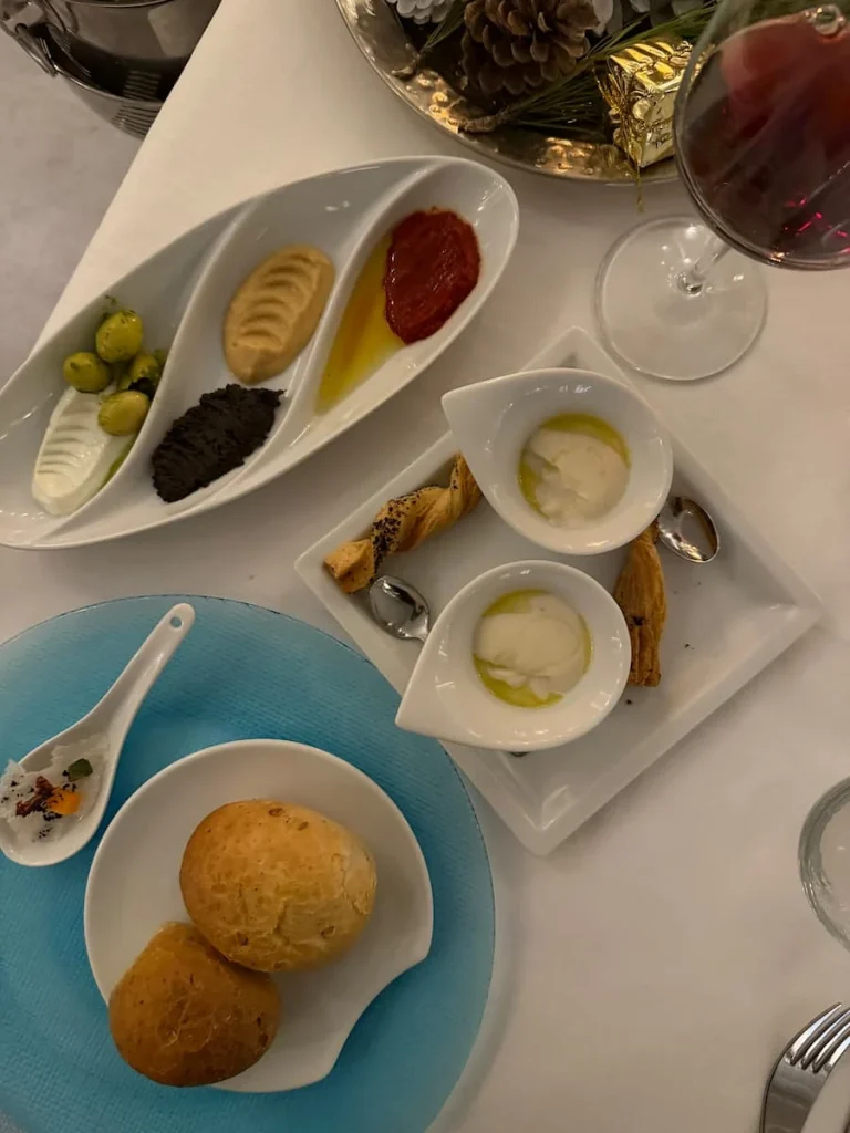 A medley of bread, harissa, olive and red pepper Starters at La Badira Restaurant, Hammamet, Tunisia